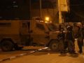 4 إصابات واعتقال مطارد في مخيم الامعري ورام الله