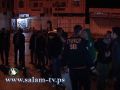 بالصور:فلسطينيون يزيلون يافطه تطالب بدولة واحدة وليس دولتين في طولكرم