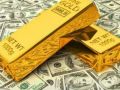 الذهب يتراجع مع صعود الدولار والنفط يهبط بأكثر من دولار