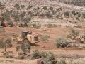 الاحتلال يواصل تجريف أراض في قرية المغير شمال شرق رام الله