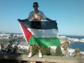 محمد القاضي ينوي رفع العلم الفلسطيني في كل دول العالم