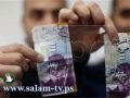 حملة جديدة على "فيسبوك" لانهاء الاحتلال من خلال الكتابة على النقود