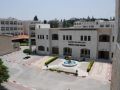 جامعة خضوري تشارك بتنظيم مؤتمر دولي حول الهندسة والبيئة البنائية في ماليزيا