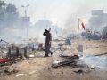 بالفيديو : جرافة تجرف وتحرق جثث قتلى رابعة