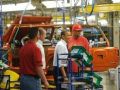 عمال مصانع السيارات أنقذوا أوباما من الفشل