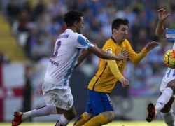ميسي يعود ويقود برشلونة لفوز ثمين أمام ملقا