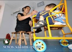 صينية فقدت ساقيها وأبويها تربي أكثر من 130 يتيماً!!