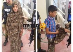 اطفال فلسطين يستخدمون لباس المرأة للوصول للاقصى