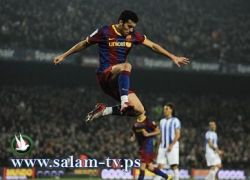 برشلونة يتوج بطلاً للدور الأول برباعية في شباك ملقة