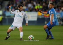 ريال مدريد يقبل هدية برشلونة ويتجاوز مالاجا بثنائية
