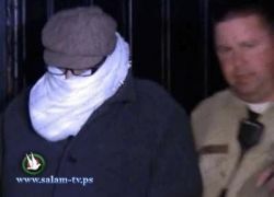 صور .. المصري صانع الفيلم المسيء ملثماً في قبضة الشرطة