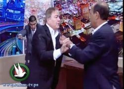 بالفيديو : نائب أردني وعلى الهواء يخلع الحذاء في وجه نائب سابق ويشهر مسدسه