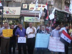 النضال الشعبي برام الله تنظم وقفة تضامنية مع الشعبين السوري والمصري
