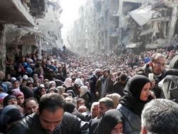 2500 فلسطيني خرجوا من اليرموك ولا دخول لمسلحين غير فلسطينين لمواجهة داعش