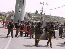 إسرائيل تدرس إزالة بعض الحواجز من الخليل وخاصة حاجز بيت حجاي